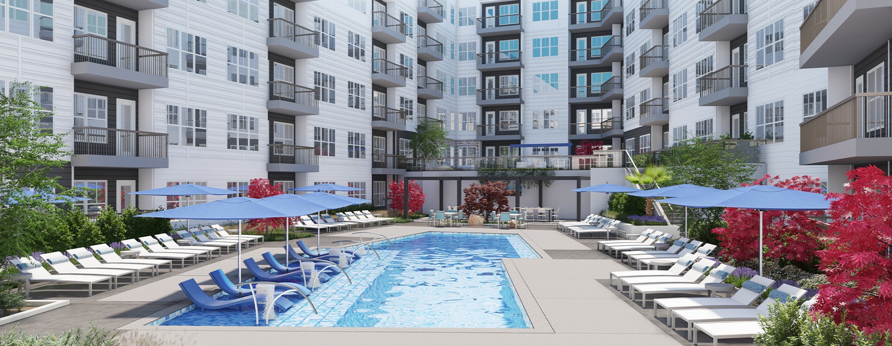 Resort-style pool with lounge seating and umbrellas around at Element Galleria Apartments